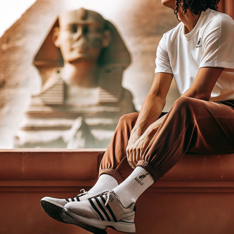 the-image-showcases-a-stylish-young-man-seated-aga
